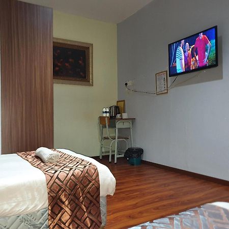 Oyo 90964 Melody 88 Inn Мири Екстериор снимка