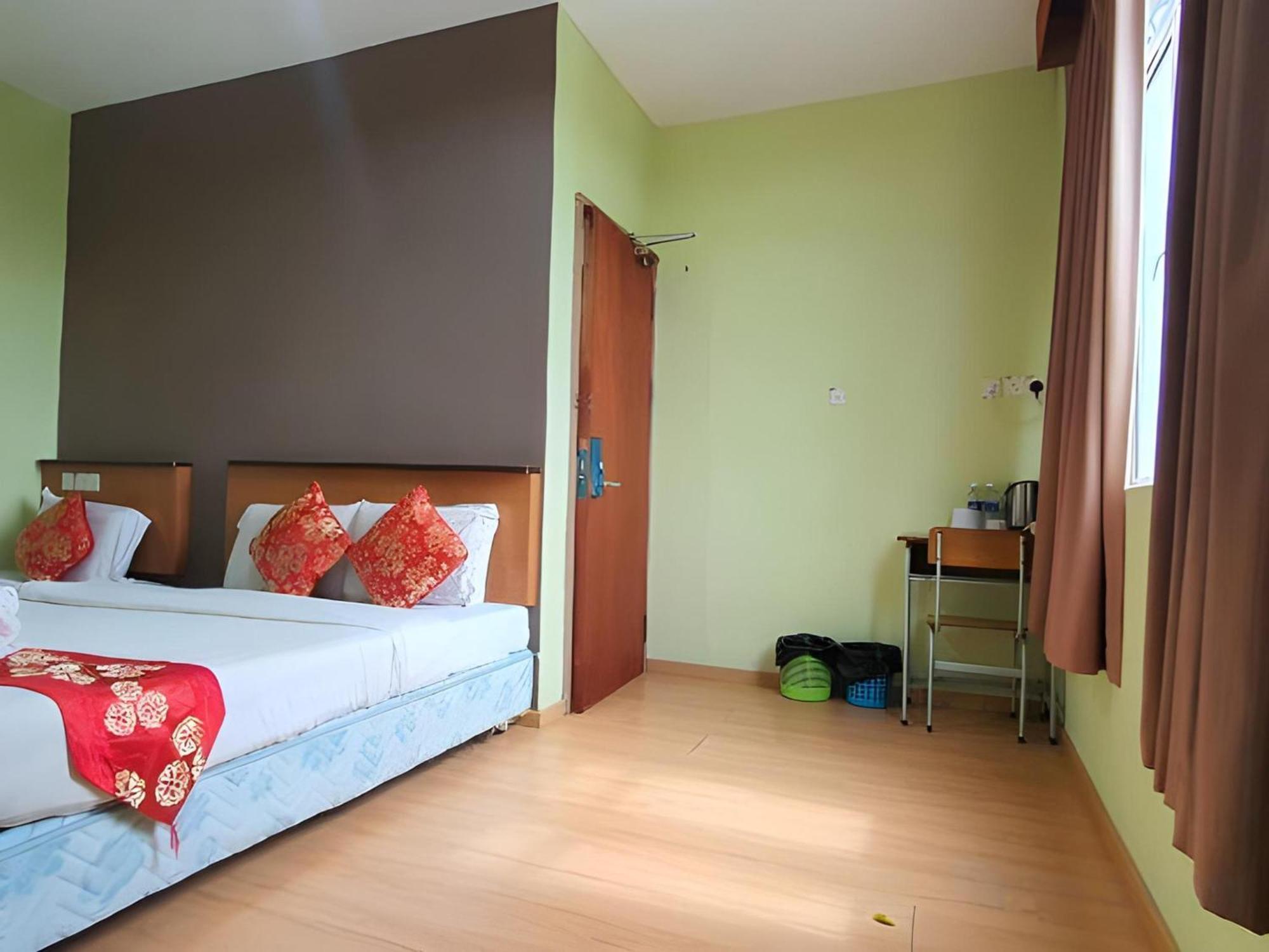 Oyo 90964 Melody 88 Inn Мири Екстериор снимка